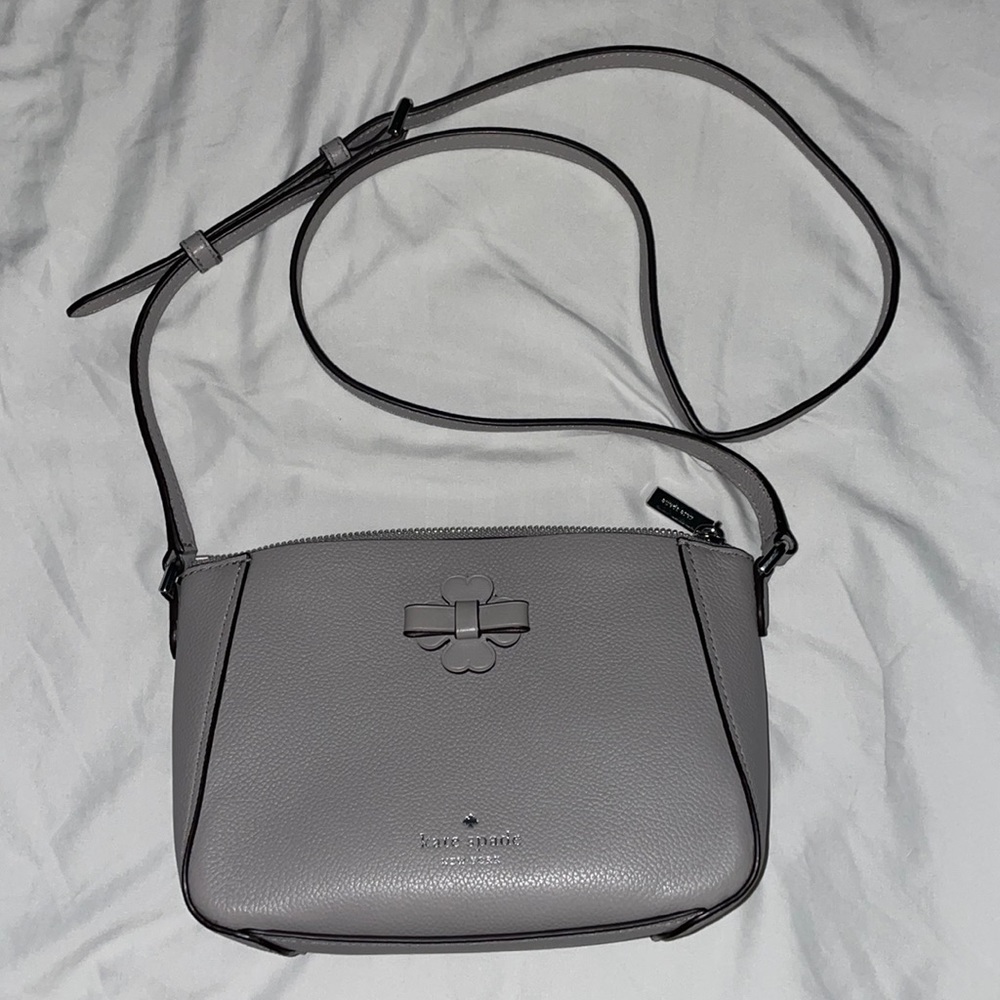 Grey Kate Spade small- mediumish crossbody bag.